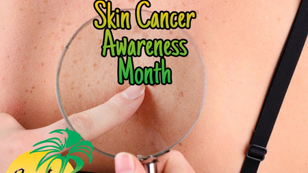 Magnifying glass pointed at skin, looking for skin cancer